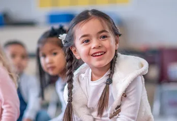 Young girl in her classroom