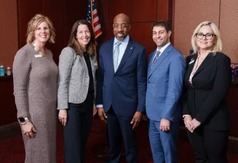 Y staff with Senator Reverend Raphael Warnock