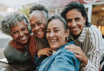 Group of smiling active older adults 
