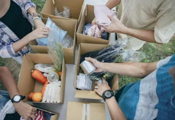 Food distributing- veggies, canned soup