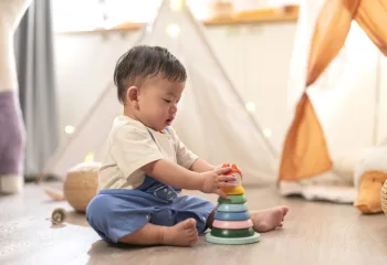 baby playing with toys