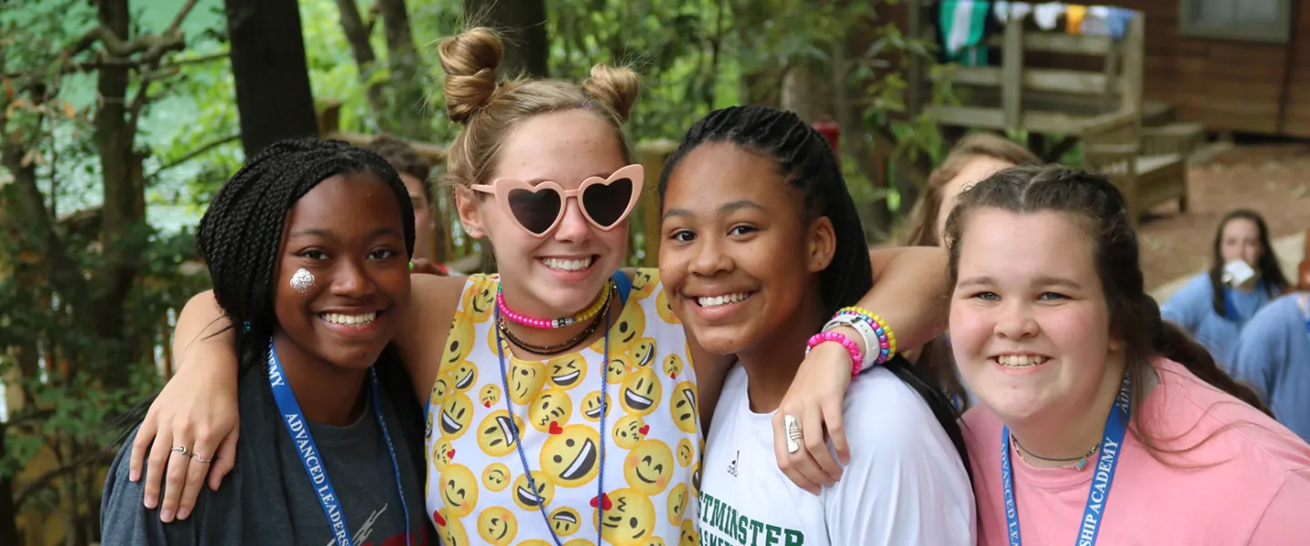 4 teen leaders at camp