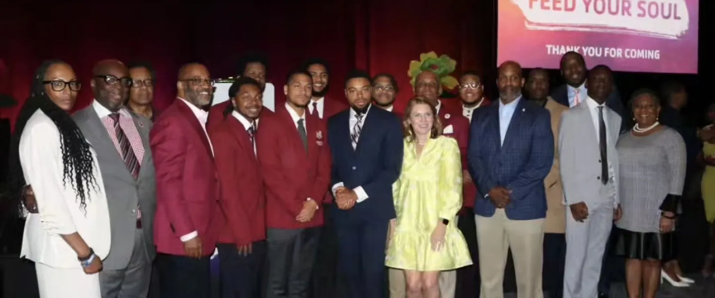 Group of people taking a group photo at the YMCA of Metro Atlanta Good Friday Breakfast 