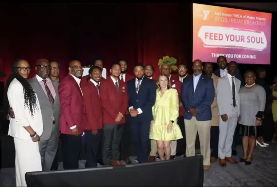 Group of people taking a group photo at the YMCA of Metro Atlanta Good Friday Breakfast 
