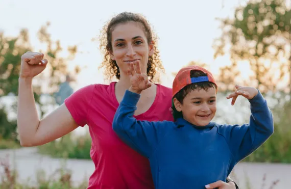 Mom and son showing muscles