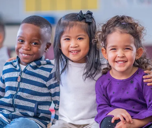 3 smiling kids