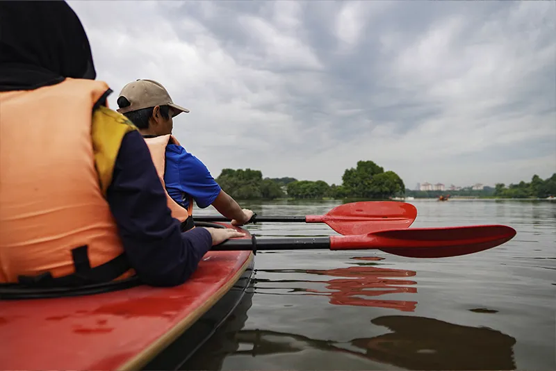 Teenagers kayaking