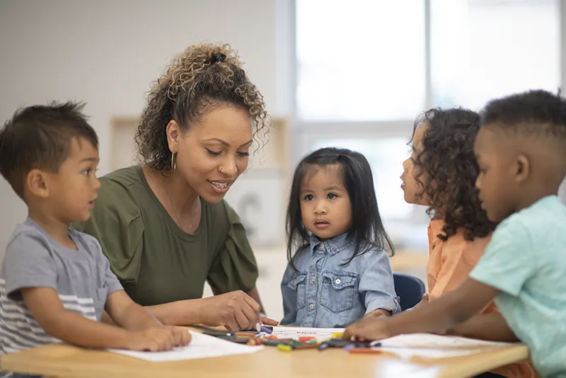 Teacher coloring with students