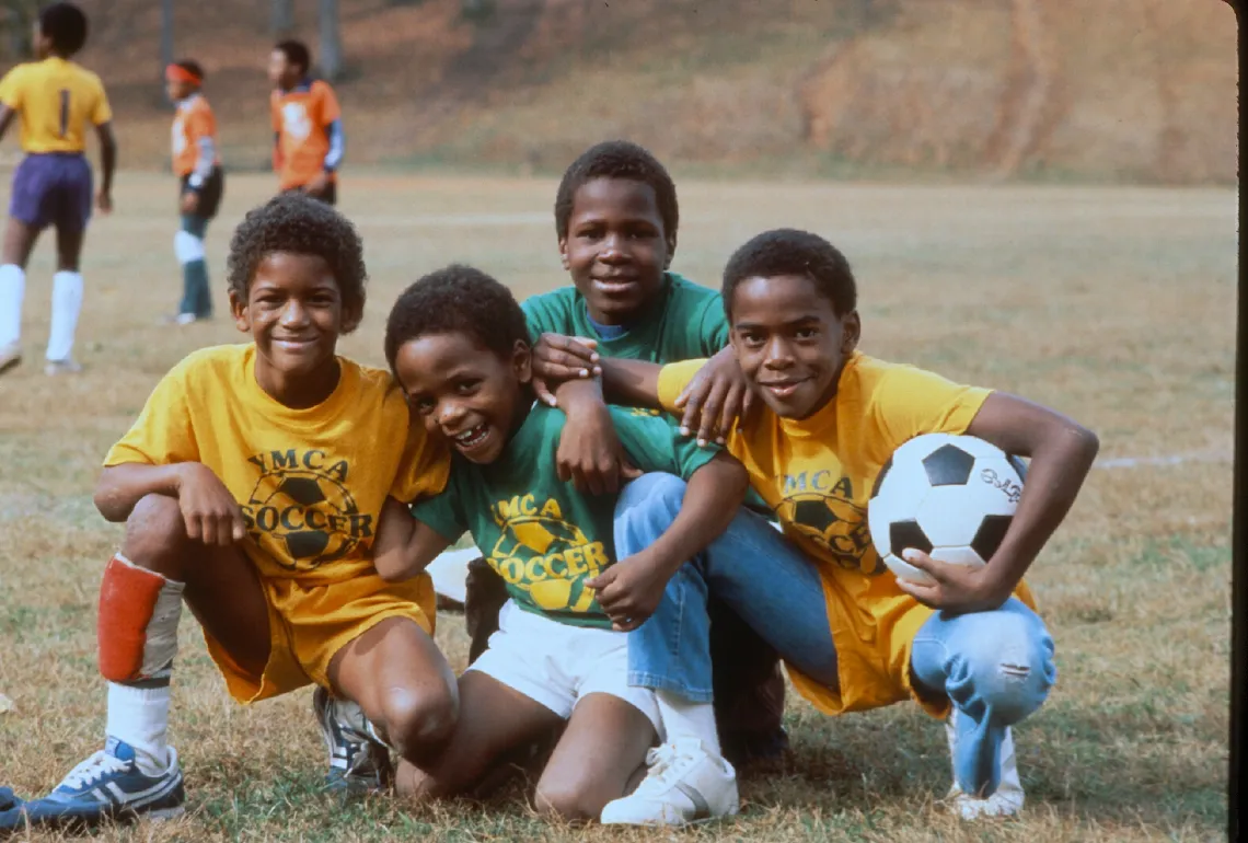 a group of soccer players from 1989 playing youth soccer at the Y